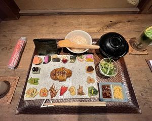 The basic meal option. Soup on the top right is covered on this picture, but was also very delicious. You get an explanation of what every item on the plate is.  at AWOMB Nishikiyamachi in Kyoto