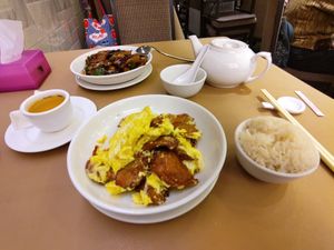Two dishes with rice and tea at Lotus Veggie - Tai Po in New Territories