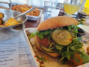 Vegan chick'n sandwich + tots + fries at Mountains Walking Brewery in Bozeman