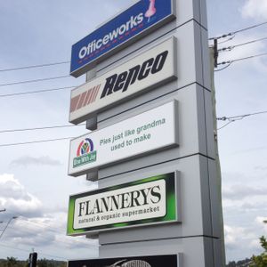 road signage at Flannerys Natural and Organic Supermarket in Logan City