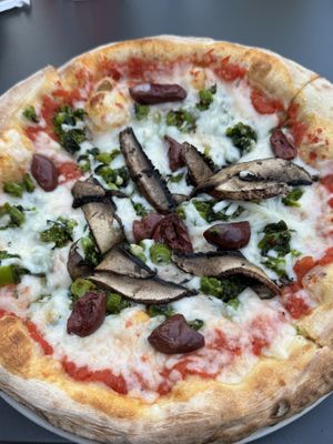 Mushroom, olive, broccoli, vegan cheesee  at Pizzeria Paradiso in Washington
