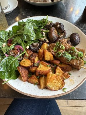 Make your own bowl: satay seitan, roasted mushrooms, spinach salad and roasted potatoes   at The Harvest in Delft