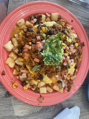 Fiesta Hash with vegan chorizo, vegan queso, just egg over potatoes   at The Breakfast Club in Des Moines