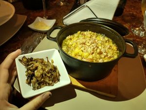 Risotto de pinhão com pesto de pinhão com cogumelos pra combinar./Risotto of Pinhão (a local nut which grows on the tall trees you see around similar in texture to a chestnut) w at Degusta in Cambara