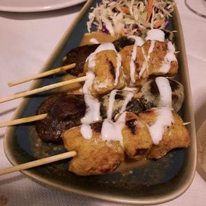 Mushroom and tofu skewers with satay sauce at Mali Vegan Thai in South West London