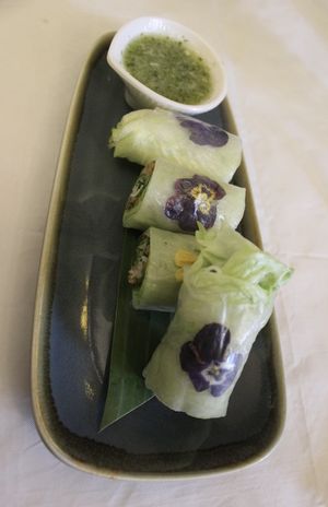 Fresh pea flowers & vegetable rolls with refreshing citrus dipping sauce  at Mali Vegan Thai in South West London