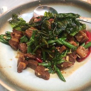 Pork style pieces in chilli and Thai basil  at Mali Vegan Thai in South West London