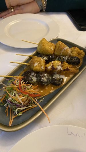 “Chicken” and mushroom skewers with satay sauce  at Mali Vegan Thai in South West London