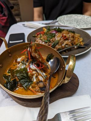 Fish in curry sauce (background drunken noodles) at Mali Vegan Thai in South West London