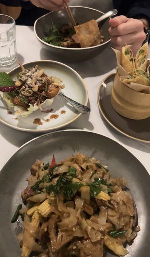 Drunken noodles, larb, spring rolls  at Mali Vegan Thai in South West London