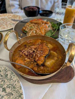 Massaman (front), pad Thai (rear) at Mali Vegan Thai in South West London