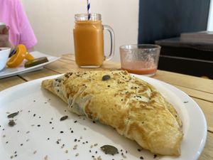French Omelette stuffed with salad, cucumber, tomato, cheese and avocado    at AUYAMA real food in Tenerife