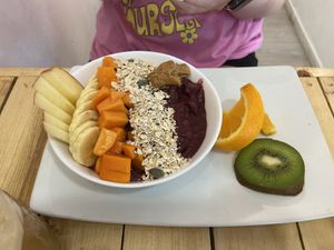 Vegan açai bowl. Smoothie base, oats, apple, banana, papaya, peanut butter   at AUYAMA real food in Tenerife