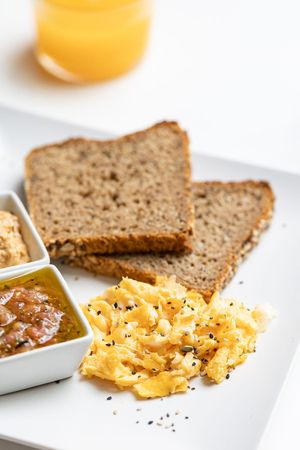 Tostadas con huevos revueltos, tumaca y hummus at AUYAMA real food in Tenerife