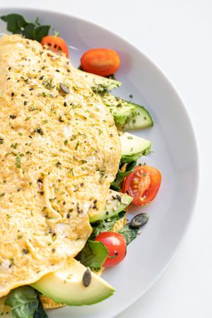 Tortilla francesa rellena de vegetales y aguacate at AUYAMA real food in Tenerife