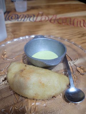 empanada, not sure about the sauce though! at El Rincon Colombiano in El Valle De Anton