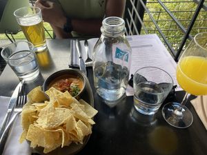 Cashew queso dip. Wait confirmed the champagne (at least on this day in May2025)  is vegan too  at Root Down - 33rd Ave in Denver