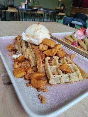 Winter special. Waffles, maple syrup, spiced apple, biscoff crumbs, vanilla ice cream (vegan) at Out-there Artisan in Jedburgh