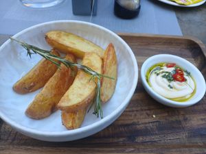 Wedges side dish to the tempeh steak at Kartausenkeller in Gaming