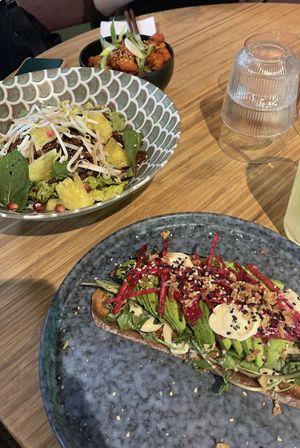 Crispy tempeh bowl, avocado toast and Korean fried cauliflower   at Veganees in Amsterdam