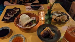 Tomato nigiri, bao buns, summer rolls and samosas at Veganees in Amsterdam