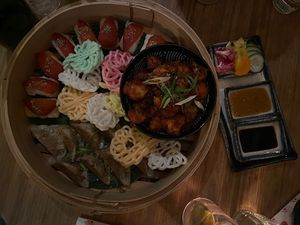 First course, with sushi, gyoza, and the cauliflower bites (and kroepoek + sauces). Forgot to photograph the mains, but those were aubergine with rice, bao buns & a papaya salad.  at Veganees in Amsterdam