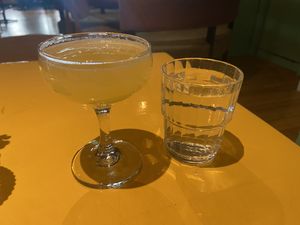 Pineapple bellini and a glass of water: allright. Their ‘real’ cocktails are a lot better.  at Veganees in Amsterdam