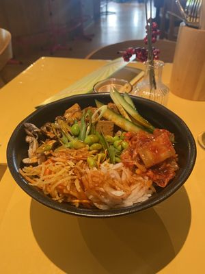 Bibimbap: really spicy, even though they didn’t mark this on the menu. It was mainly white rice with the toppings you see on the picture. at Veganees in Amsterdam