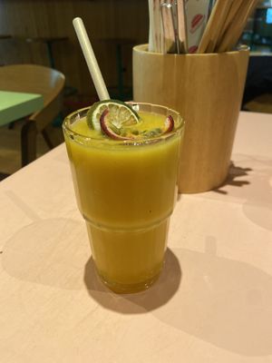 Tropical smoothie with mango and pineapple: very good and thick.  at Veganees in Amsterdam