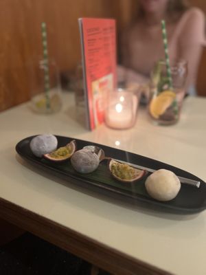 Mochi in 3 flavours: chocolate, yuzu cashew and passion fruit (€7,50)🍫  at Veganees in Amsterdam