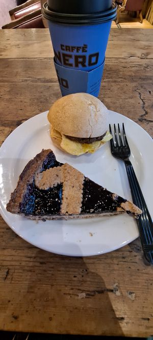 Vegan Breakfast Sandwich, Elderberry Rasberry Vegan Tart and Mocha Latte with Oat Milk at Caffe Nero - Washington St in Boston