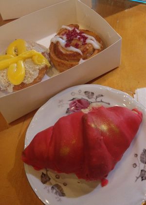 White chocolate & red fudgeice croissant, elderflower lemon curd doughnut and raspberry bun at ROUND - Helsinginkatu in Helsinki