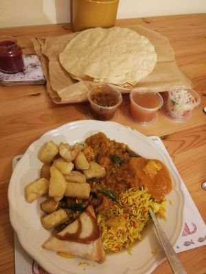 Tofu roshun, Chennai tofu, veg pilau, veg samosa, chips and poppadoms and vegan pickles at Indian Brasserie in South Shields