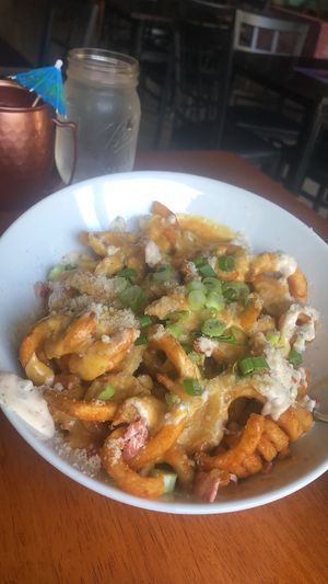 Loaded fries (must try!)  at Pauseitively Vegan in Deerfield Beach
