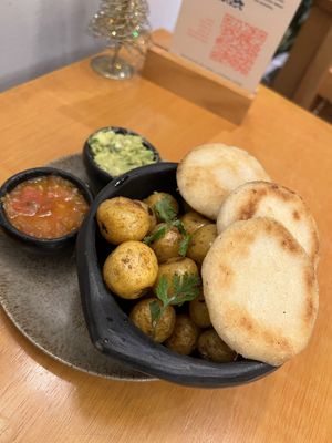 papas con hogao  at Vegan & Veggie in Medellin