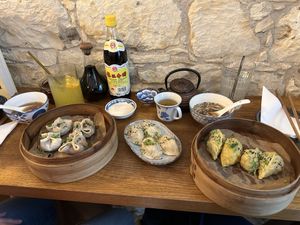 Vegan broth, vegan duck, tofu pak Choi & mushrooms, pad Thai  at Dim Sum Spot Palackého in Prague