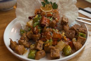 Deep fried vegan chicken with garlic and
Spring onions at The Butterfly Lovers in Berlin