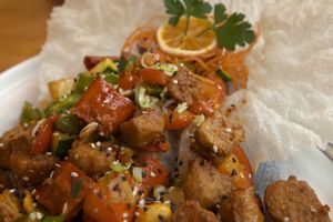 Deep fried vegan chicken with garlic and
Spring onions at The Butterfly Lovers in Berlin