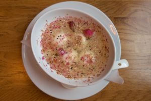 The lovely, sticky rice balls filled with black sesame in a flower brew. at The Butterfly Lovers in Berlin