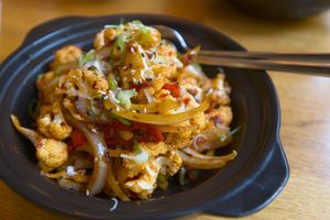 Stir fried cauliflower with bell peppers at The Butterfly Lovers in Berlin