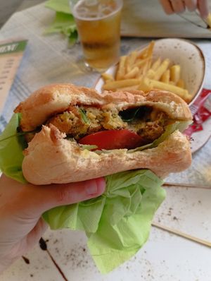The burger comes with 2 patties and cheese. And we added ketchup ourselves. Could have more salad, but it was nice anyway. at Bistro 23 Four in Gozo