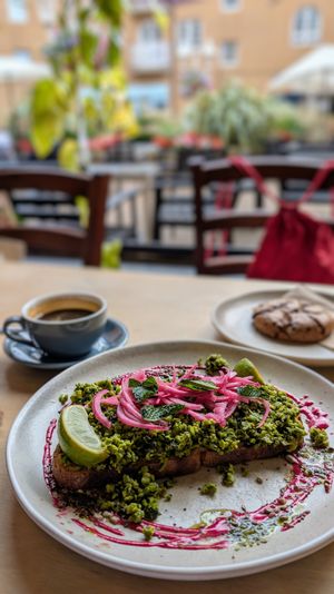 The Peas on toast, and a vegan chocolate chip cookie at Laughing Dog in Brighton