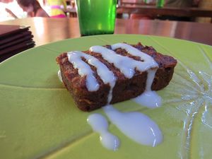 Carrot Pumpkin Cake 
Milled heirloom rice flour, raisins and vanilla coconut cream.
 at Soma Cafe in Ubud