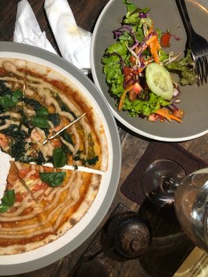 2 sorts of vegan pizza with side salad. Hubby ate to quick to get a better pic. at Soma Cafe in Ubud