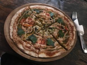 Mediterranean pizza with vegan cheese at Soma Cafe in Ubud