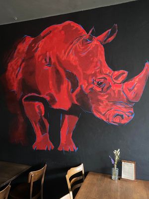 Our beloved rhino, drawn by hand by a local artist. Powerful herbivore in the house! at Mairübe in Luzern