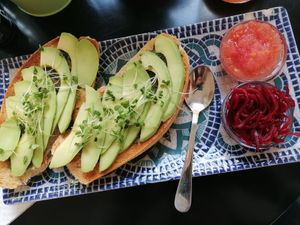 Avo toast with pesto tomato and beetroot at REVIV in Malaga