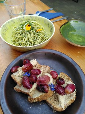 2nd course: bruschetta with cashew ricotta and grilled grapes, linguine with cavalo nero pesto at De Nieuwe Kantine in Arnhem
