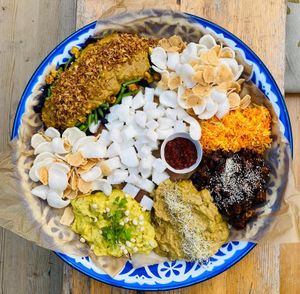 Indonesian platter.
Gado gado, cabbage, potato, peanut sauce
Lontong
Atjar, white cabbage, carrot. 
Babi ketjap tofu.
Rendang, jackfruit, coconut.
Ayam opor, vegan chicken. at De Nieuwe Kantine in Arnhem