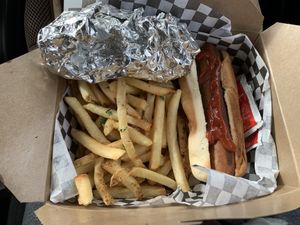 Hotdogs with a side of fries  at Vegan Junk Food in Portland